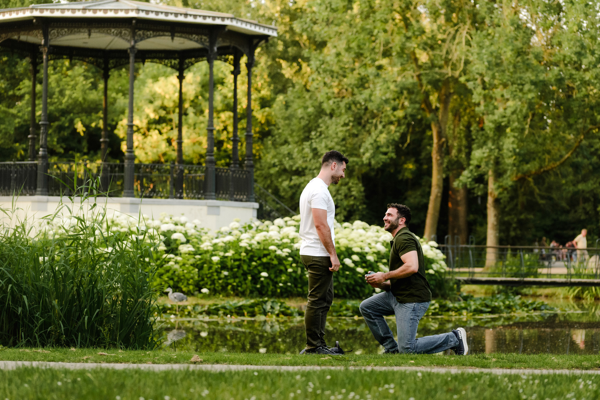 Couple during their engagement photo session on a bridge in Amsterdam