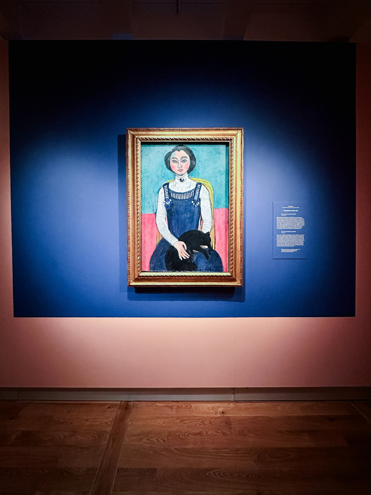 Marguerite with a Black Cat by Henri Matisse, 1910, showing his daughter Marguerite seated with a black cat in her lap.