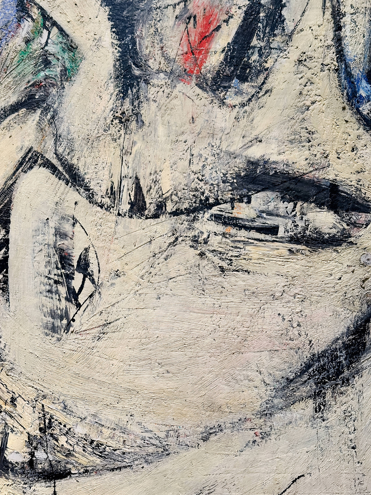 Close-up of layered white, black, blue and red brushstrokes in Willem de Kooning’s Excavation.