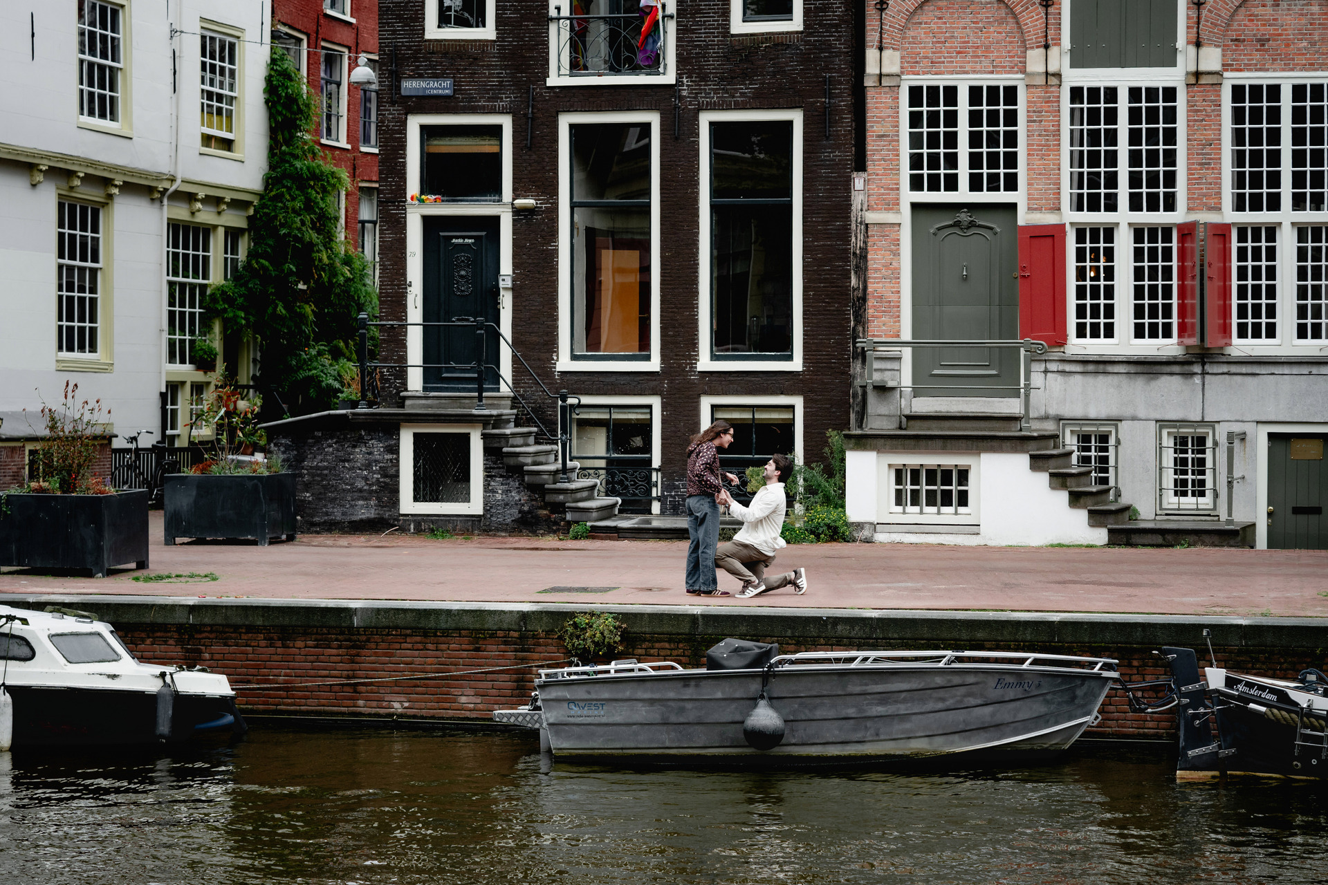 Surprise engagement proposal in the Amsterdam Canal Belt, 2026.