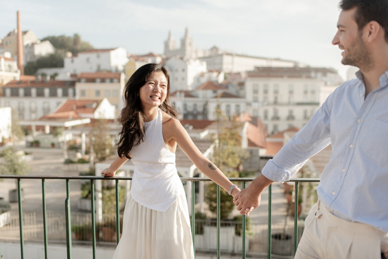 couple newly engaged in Portas do Sol, Lisbon, Portugal