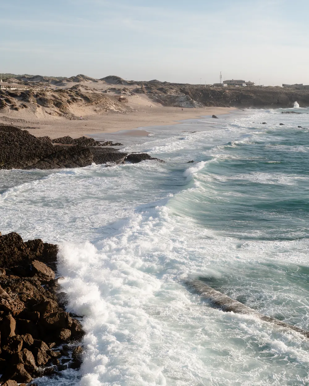 Atlantic waves breaking on the rocks along Praia do Guincho, Cascais proposal photography by Mariana Castanheira