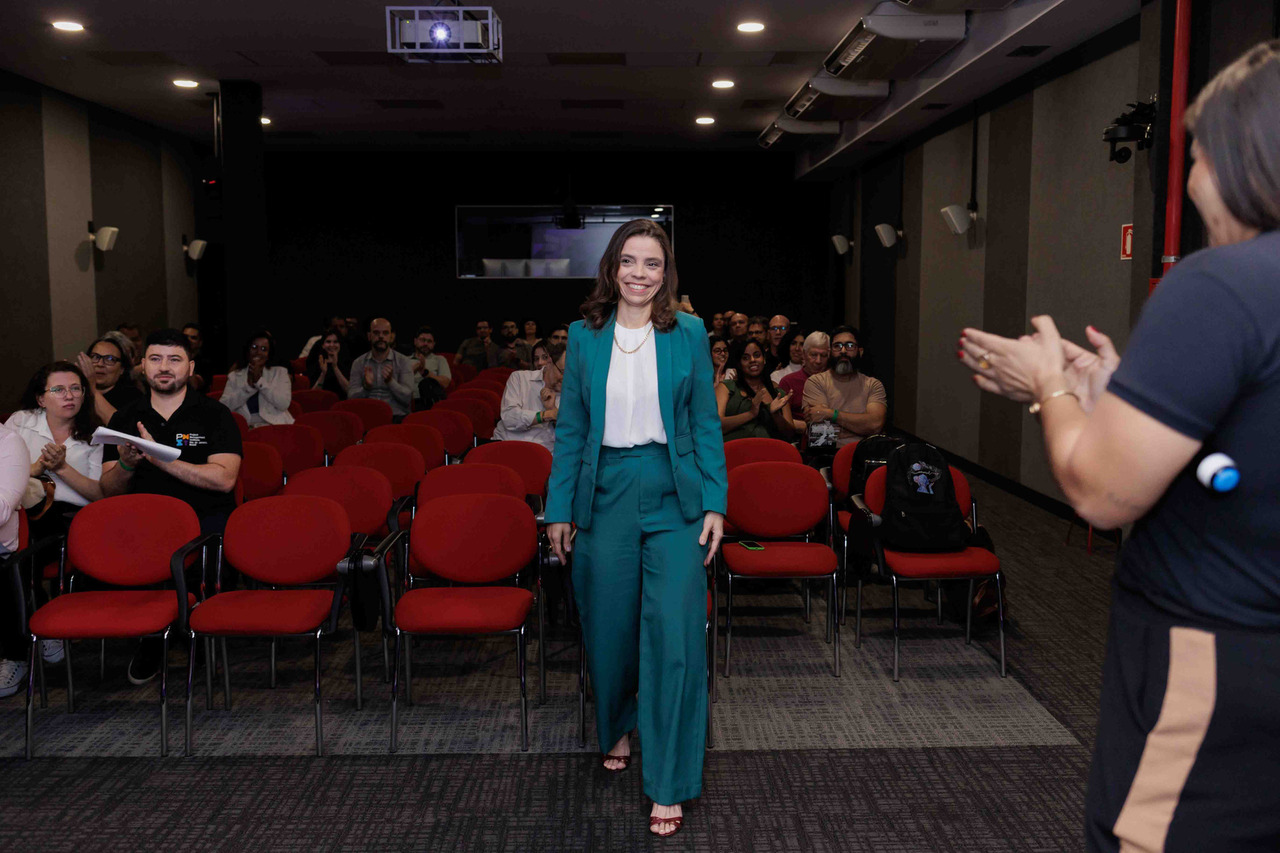 Foto da cliente no anúncio da premiação