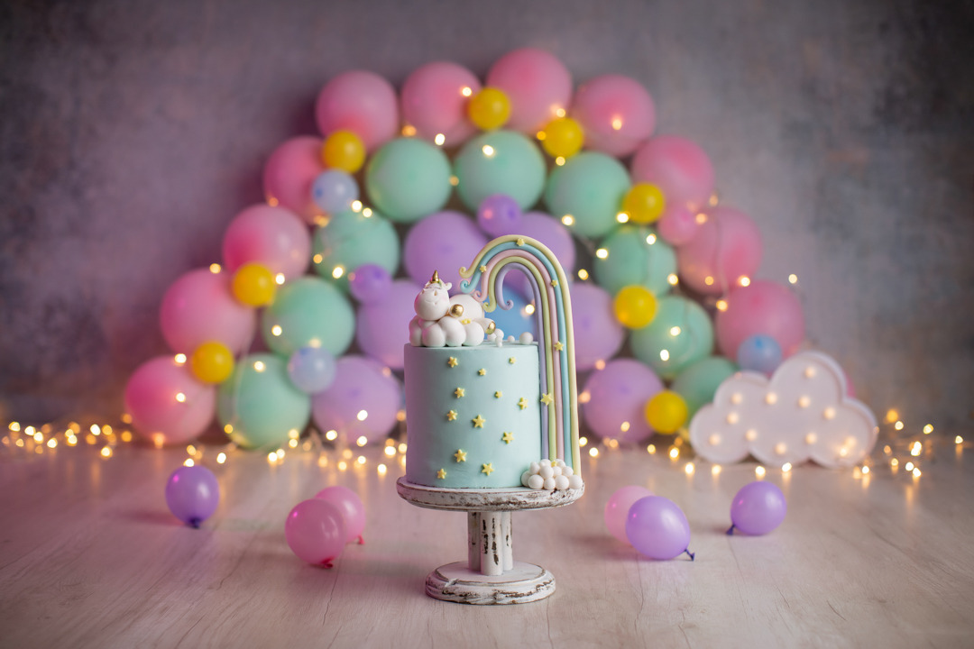 Smash the Cake Unicórnio e Arco-Íris mae de menina ensaio de aniversário de bebe