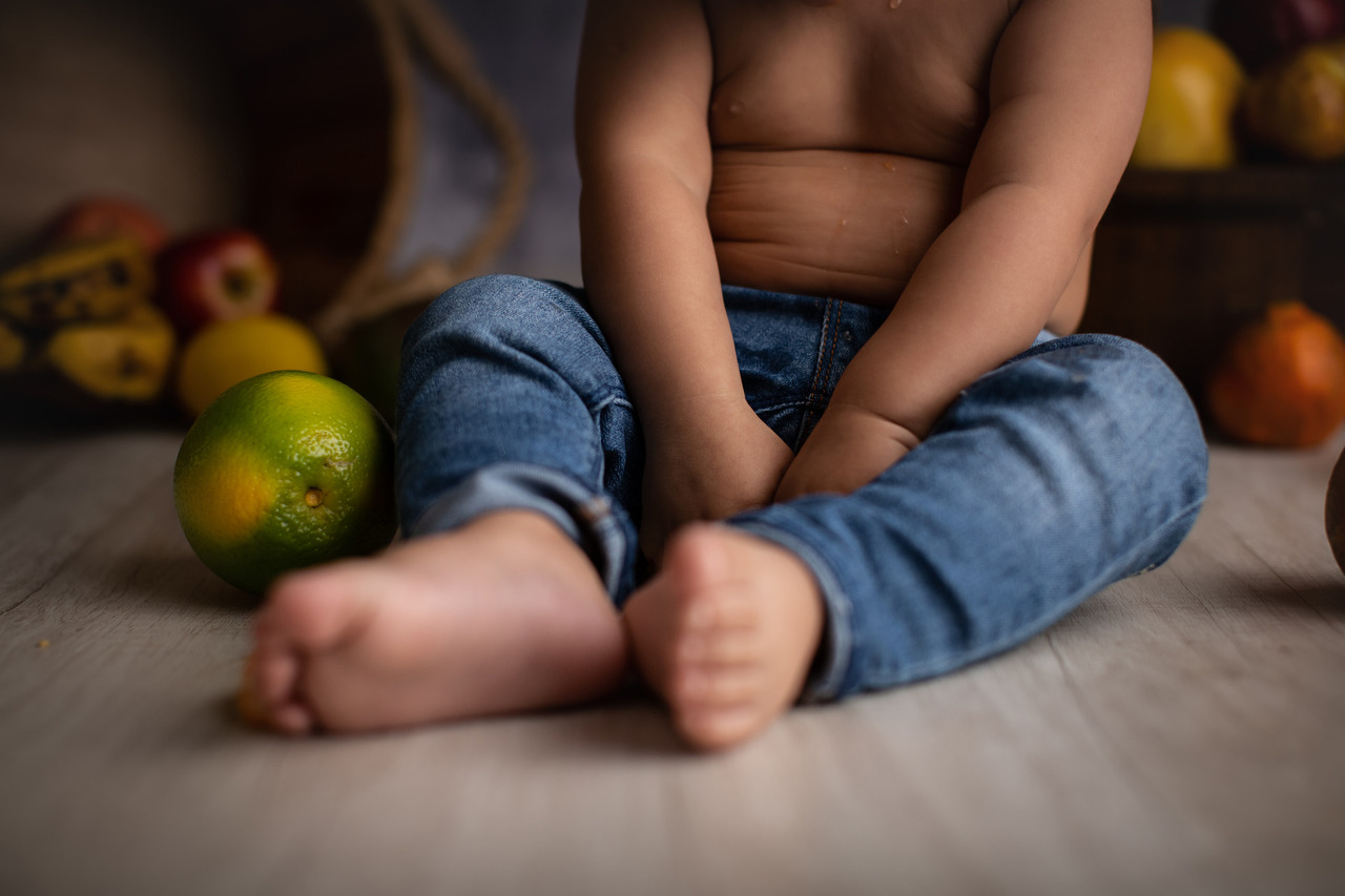 ensaio de bebe com fruta