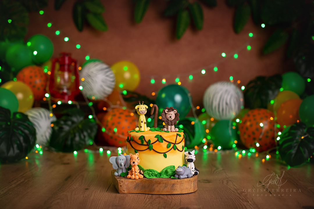 Smash the Cake safari com tons amarelo laranja bolo de aniversario ensaio de bebe 1 ano